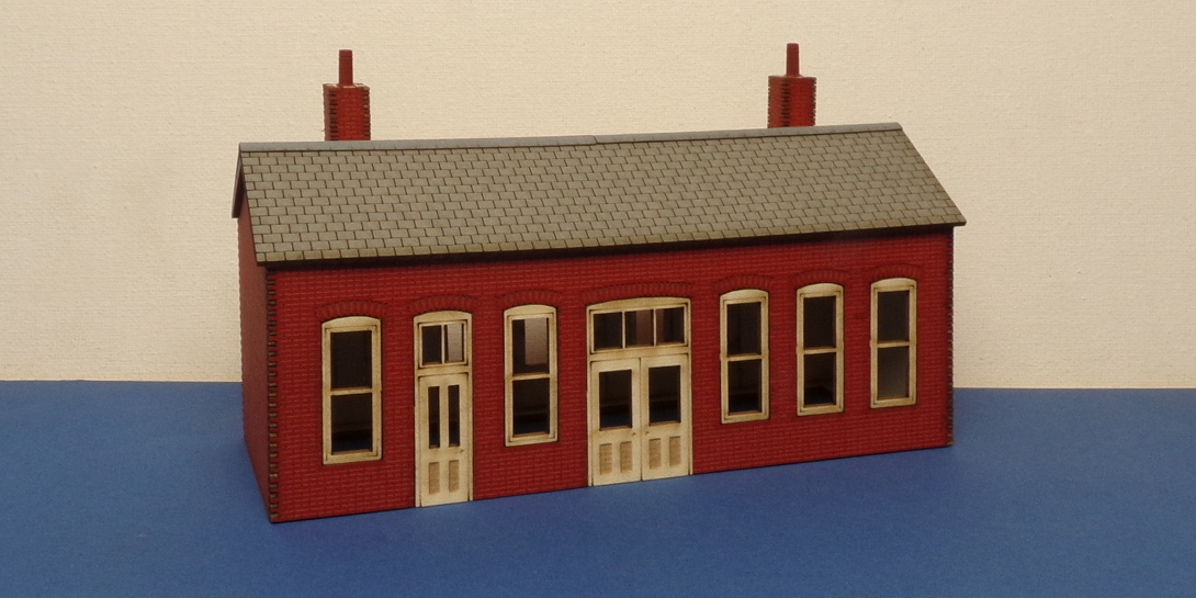 J 00-01 OO gauge station Kit designed for younger modeller or for those who are starting their modelling journey. Made with pre coloured wood fiber board. A station building would typically house the ticket office, station master's office, as well as waiting rooms and toilets.

Requires some basic modelling supplies to complete.
